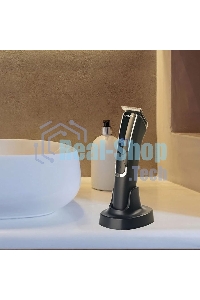 Машинка для стрижки Scarlett SC-HC63C73 черный 5Вт (насадок в компл:4шт)