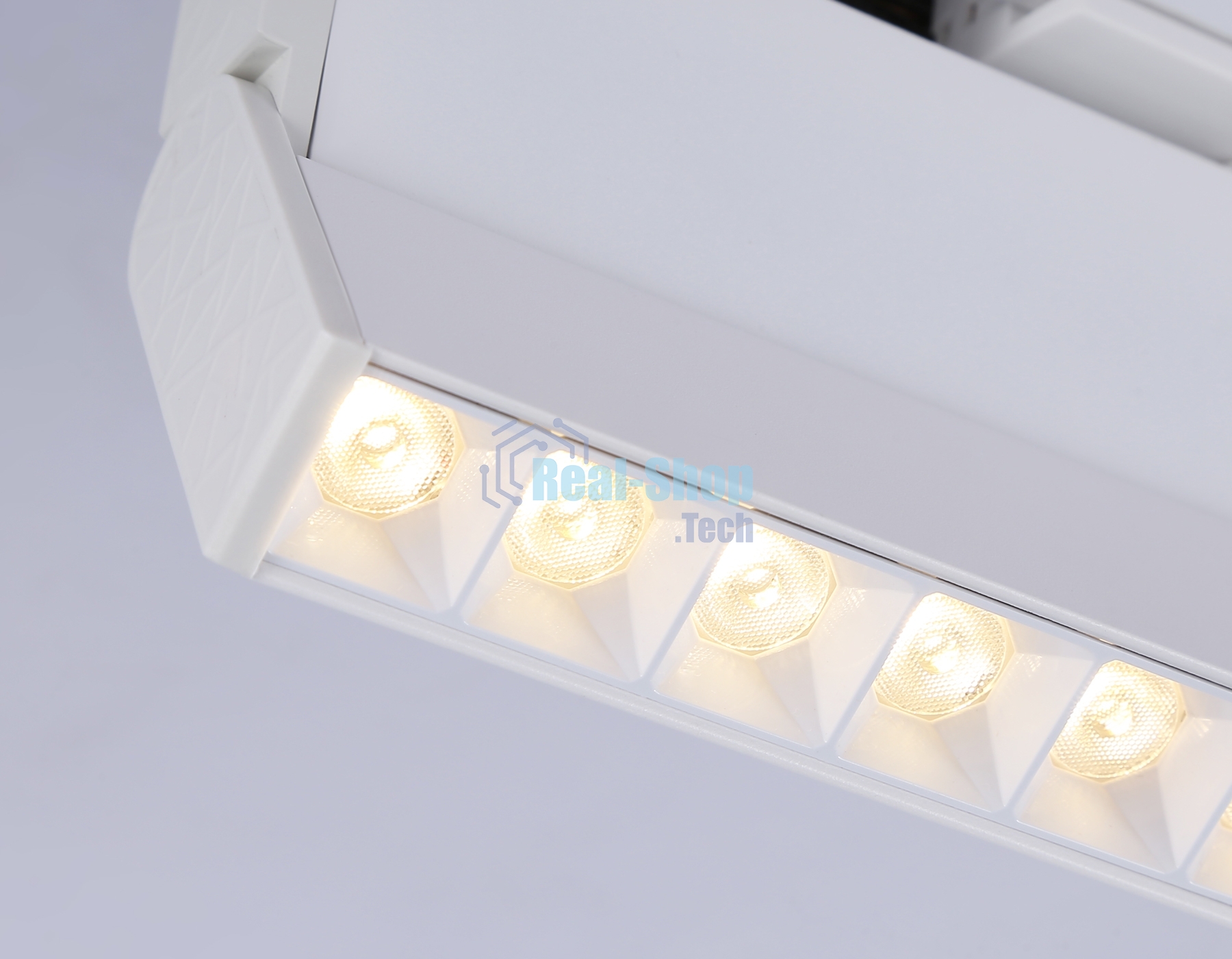 Трековый однофазный светодиодный светильник Ambrella light GL6815 WH белый LED 12W 3000K 24° 230*22*87
