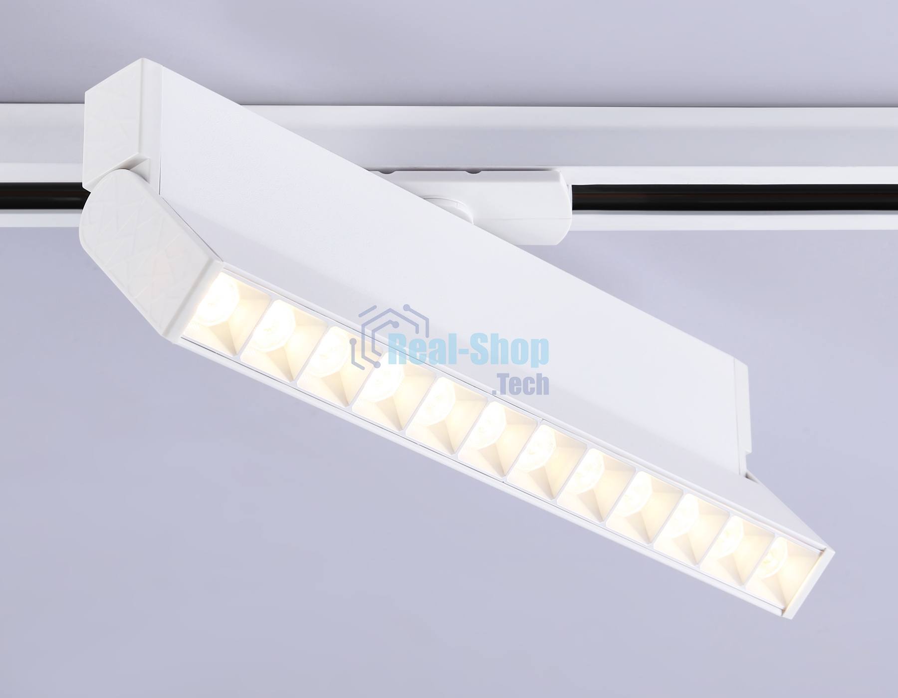 Трековый однофазный светодиодный светильник Ambrella light GL6815 WH белый LED 12W 3000K 24° 230*22*87