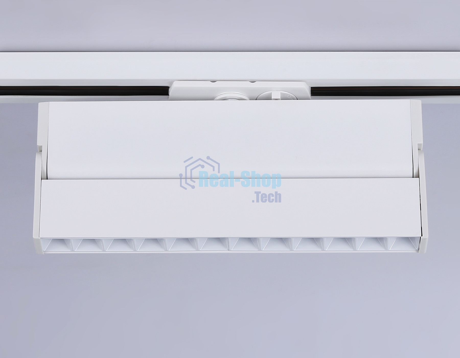 Трековый однофазный светодиодный светильник Ambrella light GL6815 WH белый LED 12W 3000K 24° 230*22*87